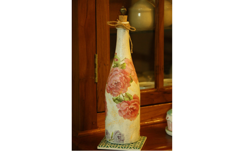 handcrafted decoupaged bottle