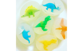 Transparent soap with rubber dinos